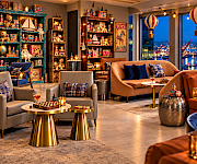 The Toy Room at Fog Room with vintage toy shelves, hot air balloon teddy bears and a waterfront night view